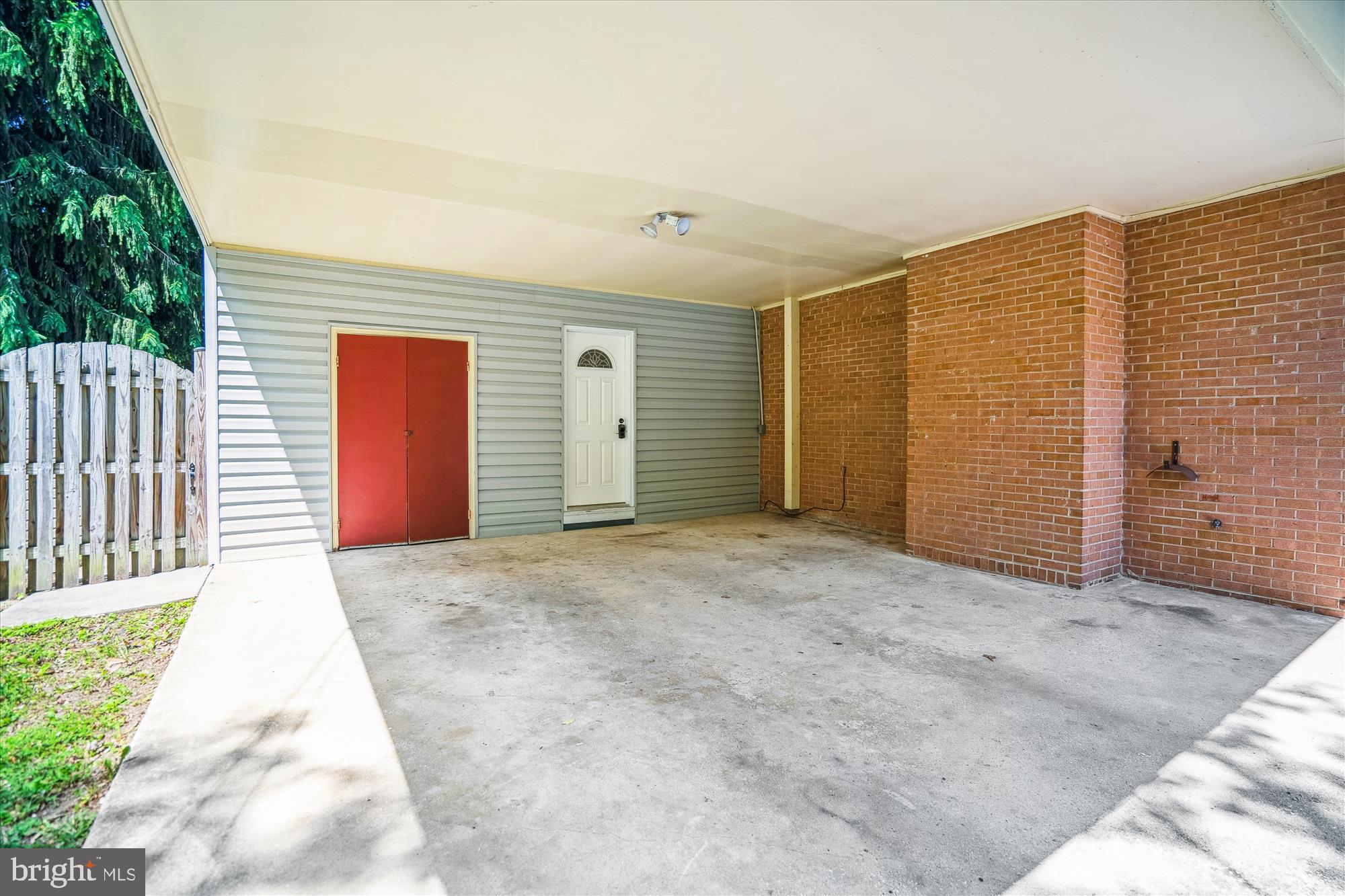 2445 Parallel Lane Silver Spring, MD 20904 - Photo 38 of 82 Carport - storage through red doors
