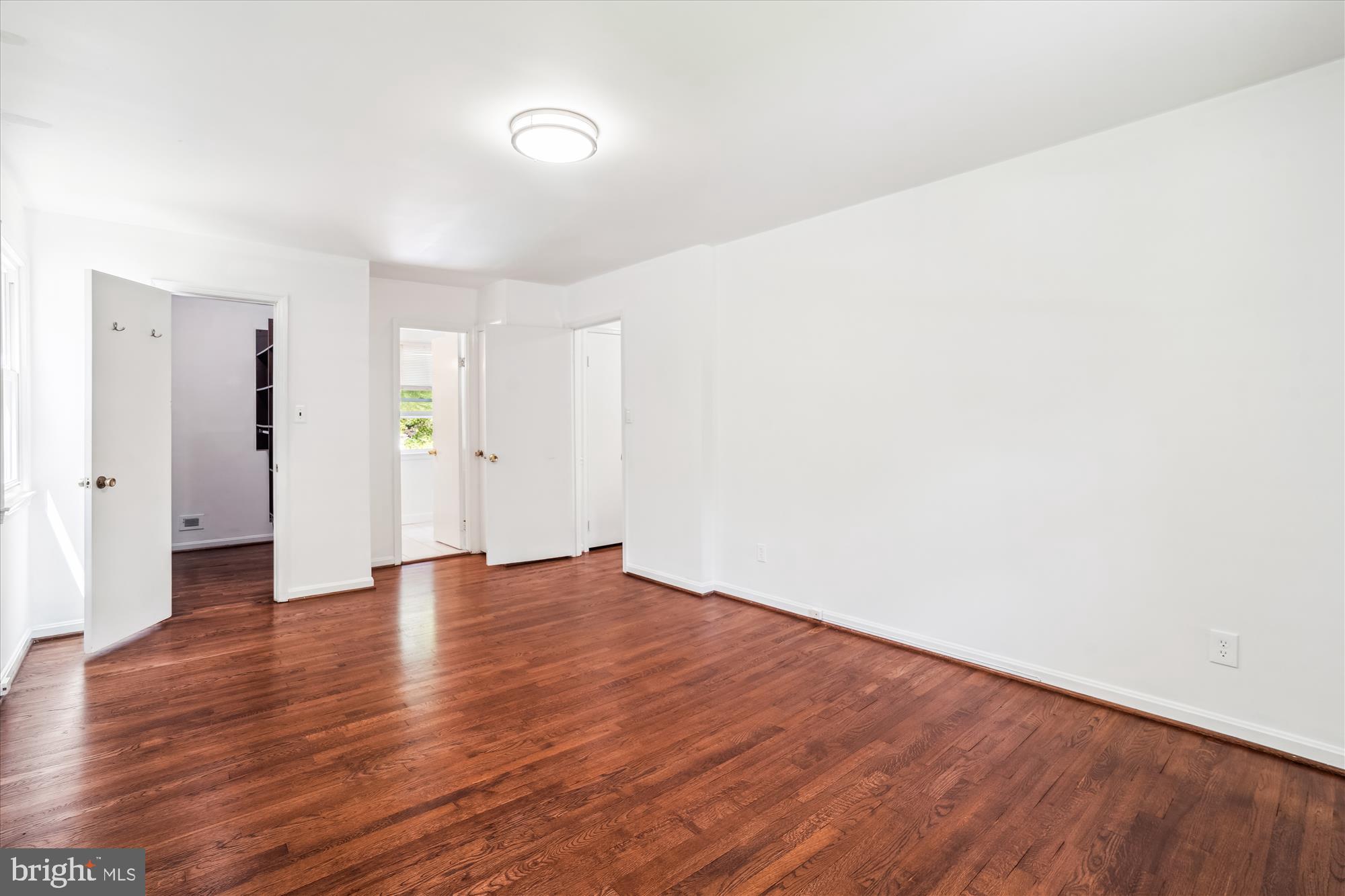 2445 Parallel Lane Silver Spring, MD 20904 - Photo 39 of 82 a view of an empty room with wooden floor