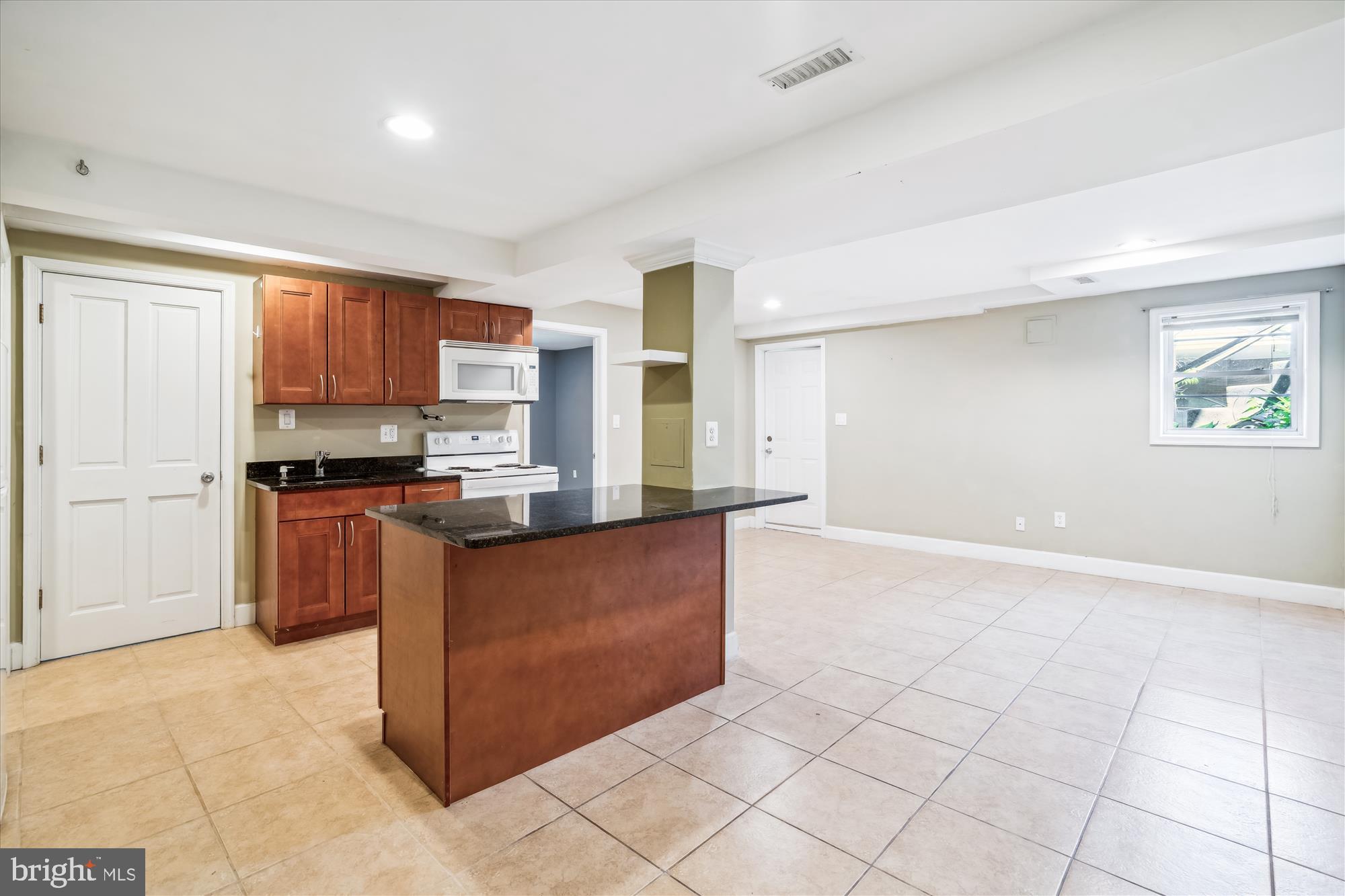 2445 Parallel Lane Silver Spring, MD 20904 - Photo 53 of 82 a kitchen with stainless steel appliances granite countertop a stove and a refrigerator