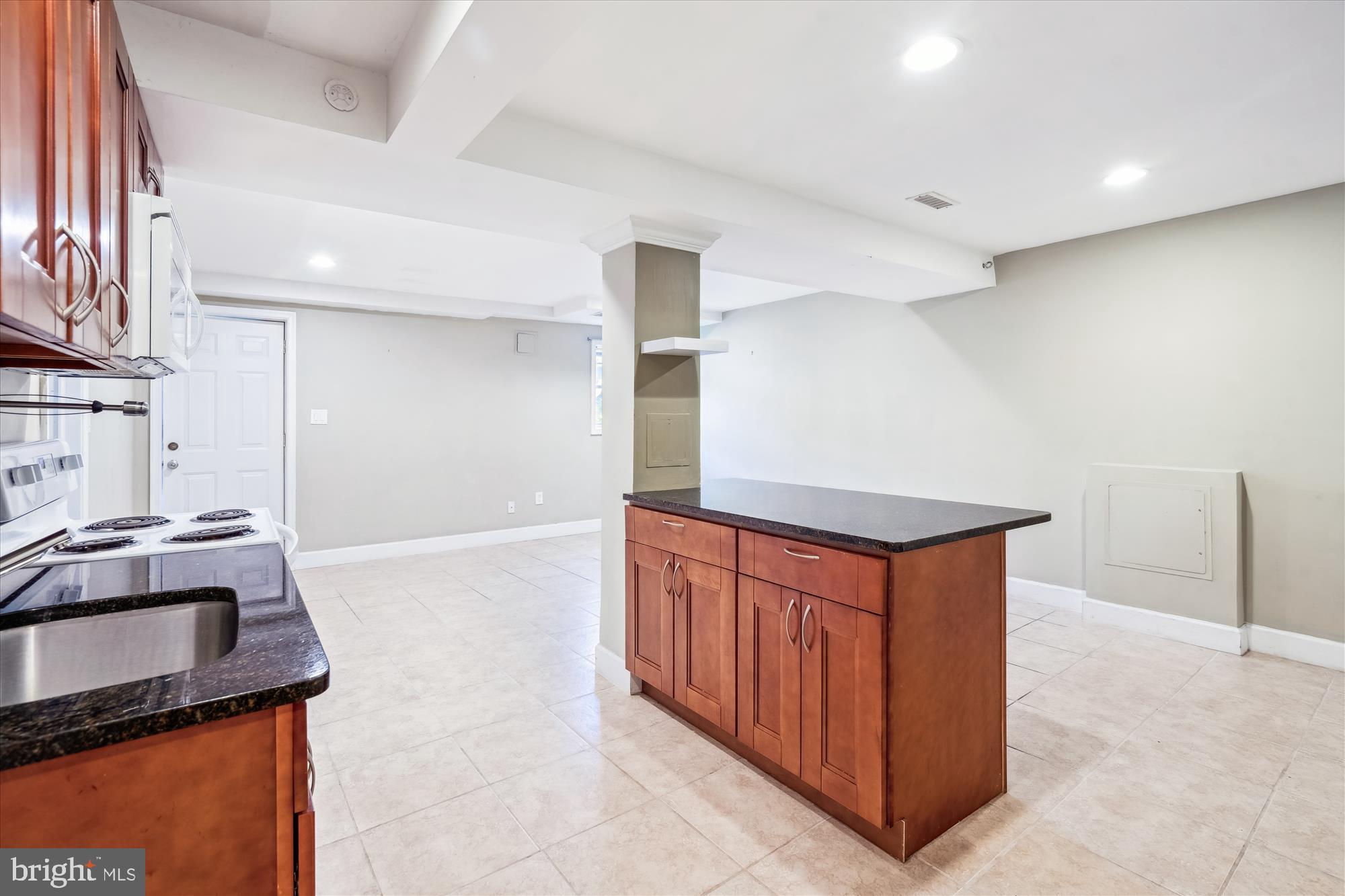 2445 Parallel Lane Silver Spring, MD 20904 - Photo 57 of 82 a kitchen with stainless steel appliances granite countertop a sink a stove and a refrigerator