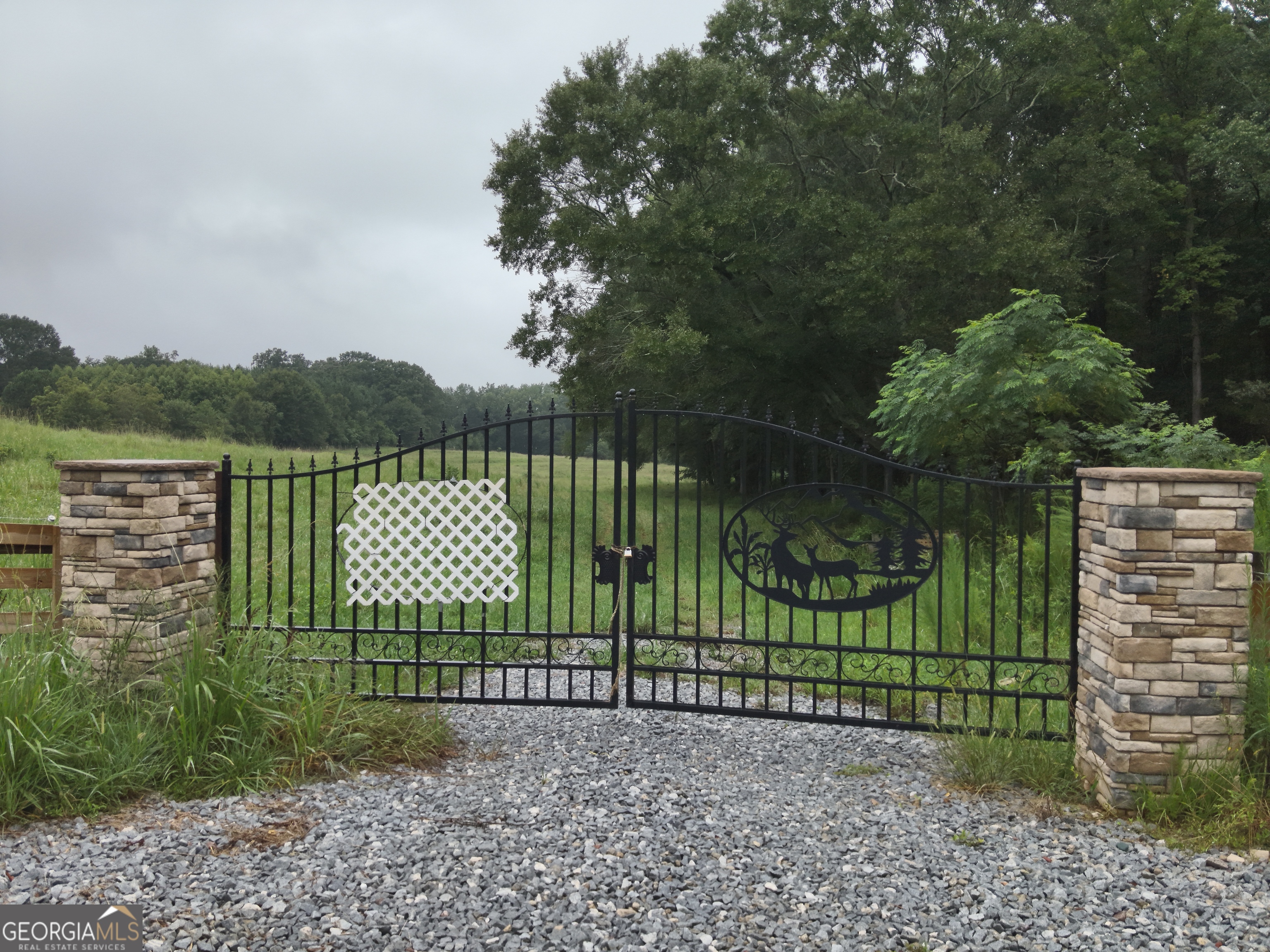 0 2nd Avenue East Colbert, GA 30628 - Photo 13 of 23 a view of a park with iron fence