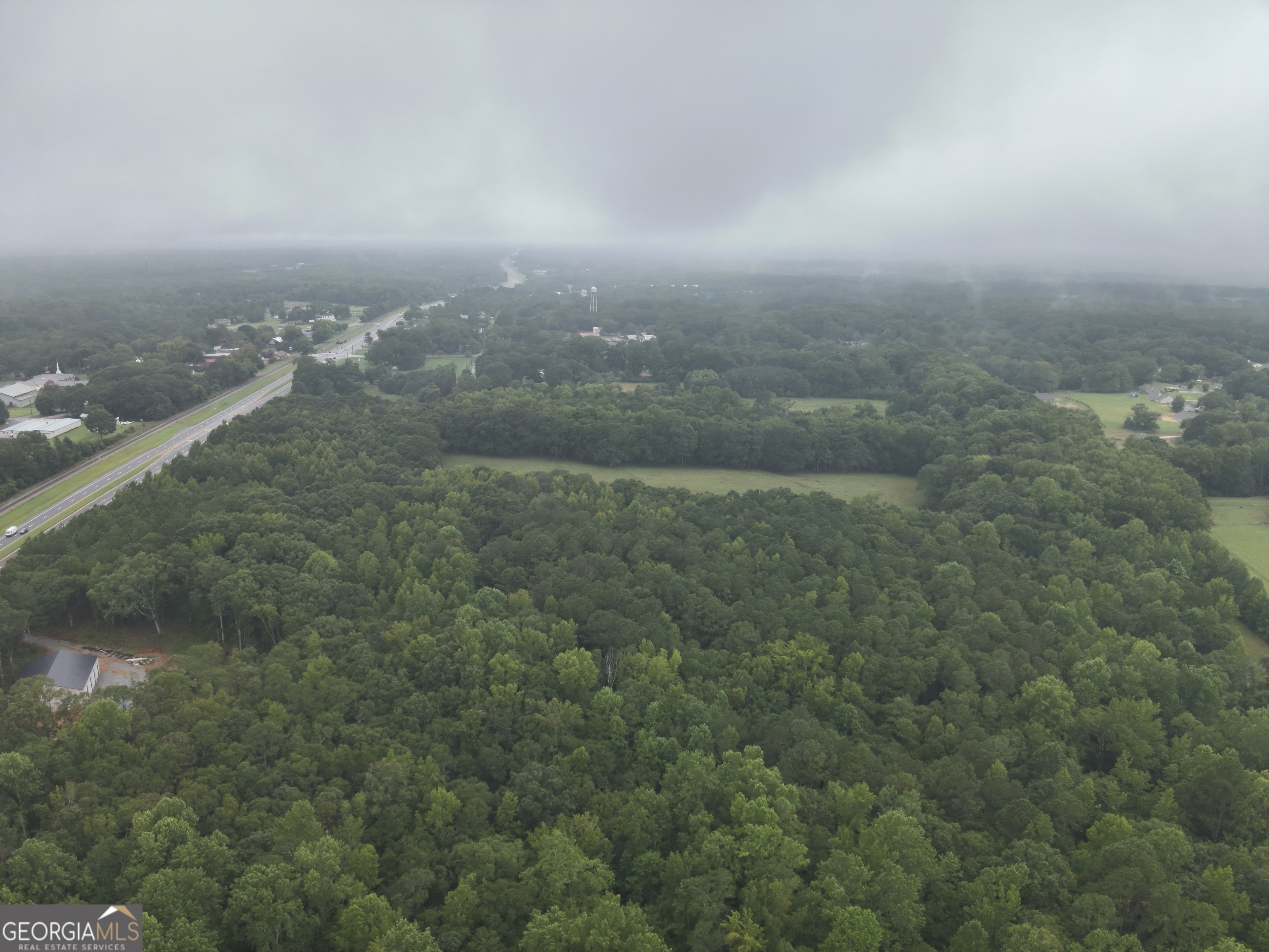 0 2nd Avenue East Colbert, GA 30628 - Photo 17 of 23 a view of a big yard of a house
