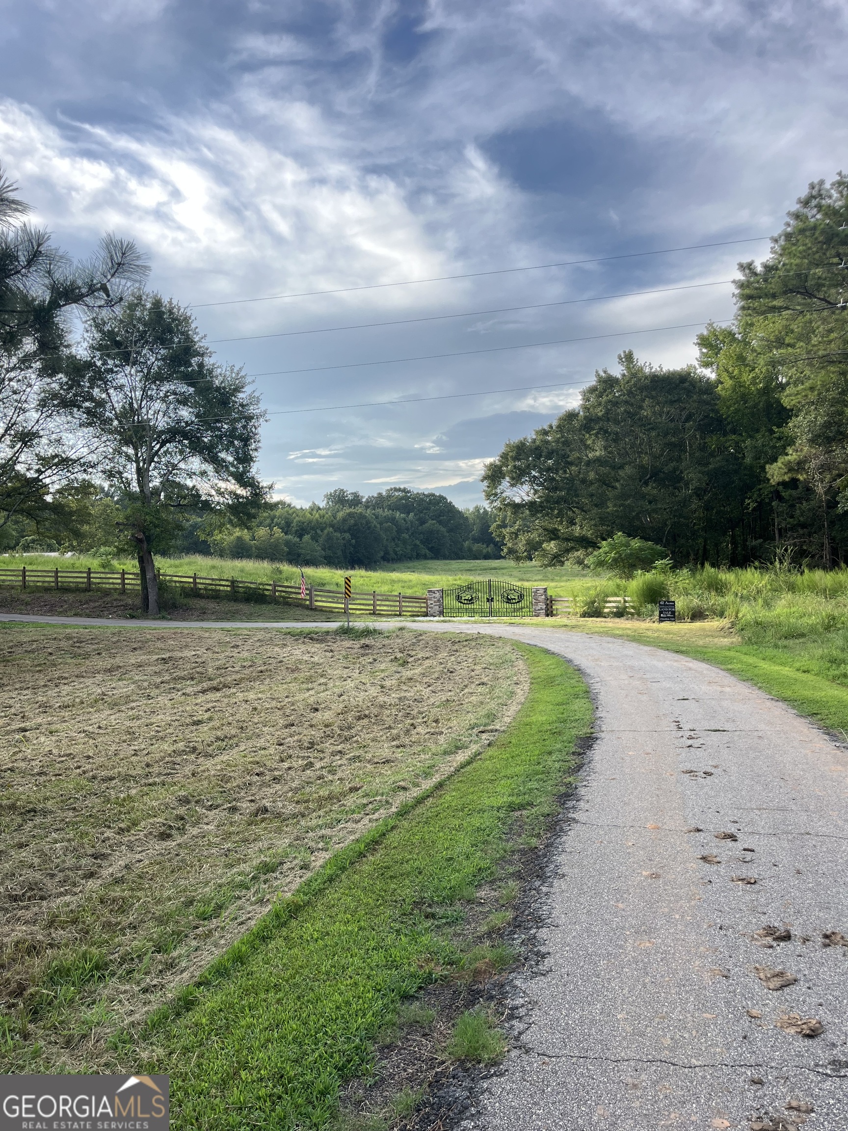 0 2nd Avenue East Colbert, GA 30628 - Photo 5 of 23 a view of a lake with a big yard