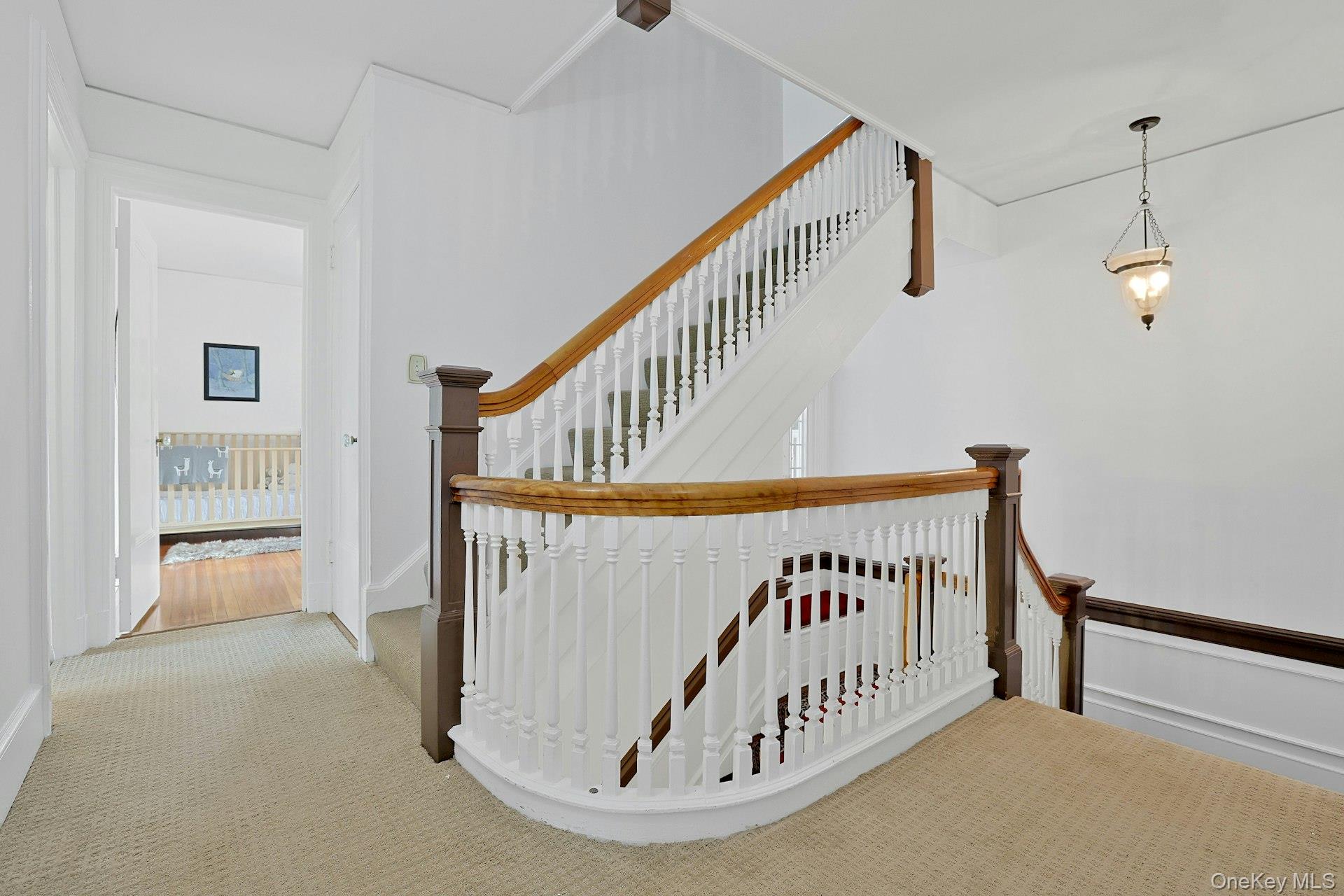 49 Overlook Circle New Rochelle, NY 10804 - Photo 25 of 47 a view of a hallway with staircase