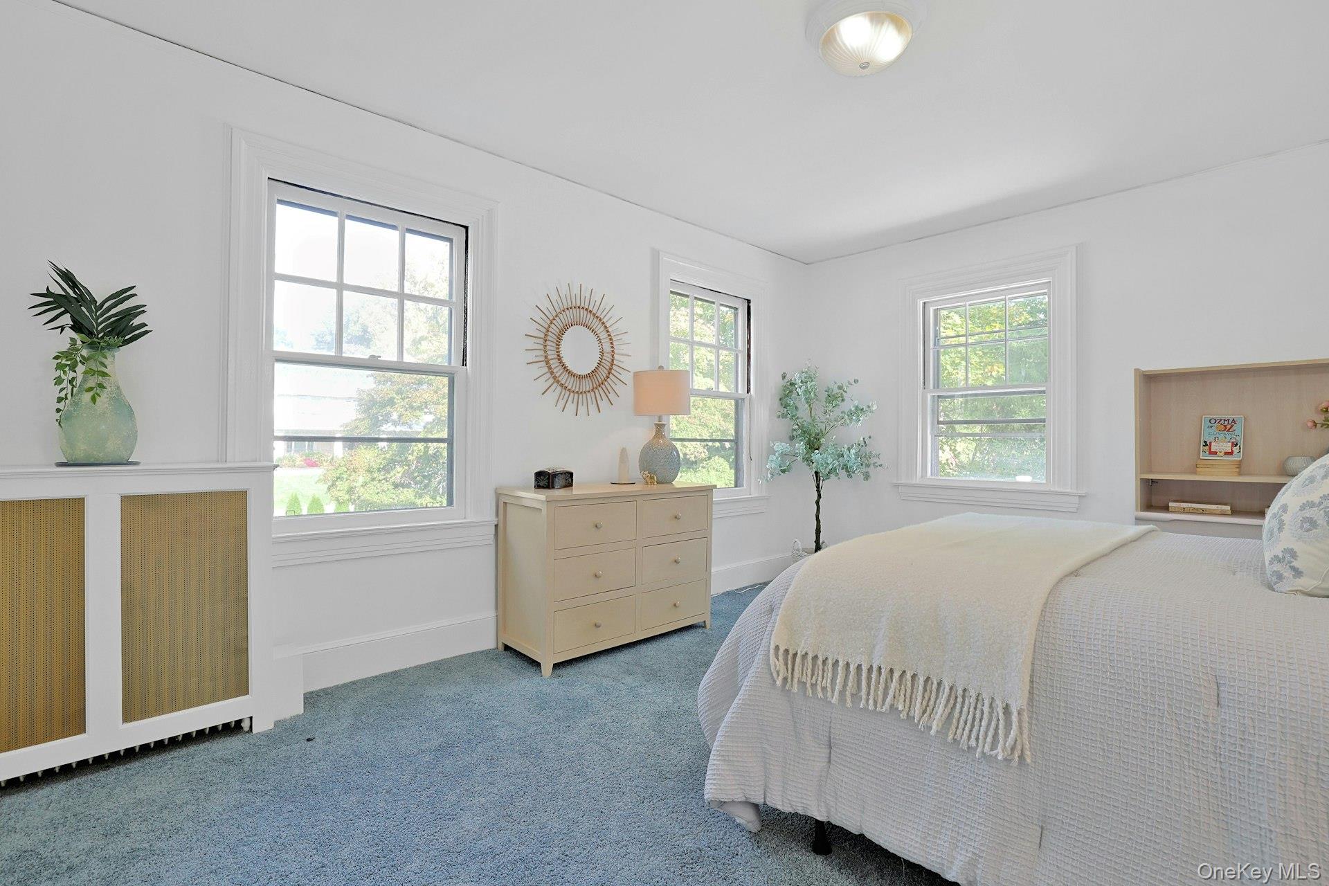 49 Overlook Circle New Rochelle, NY 10804 - Photo 30 of 47 a bed room with a bed and a window