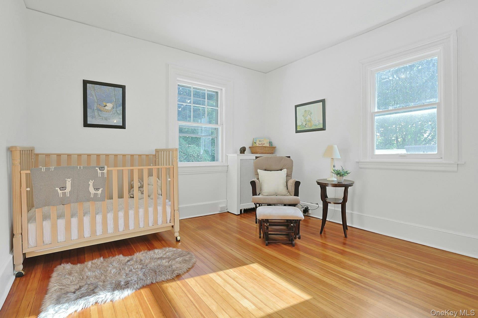49 Overlook Circle New Rochelle, NY 10804 - Photo 33 of 47 a living room with furniture and a window