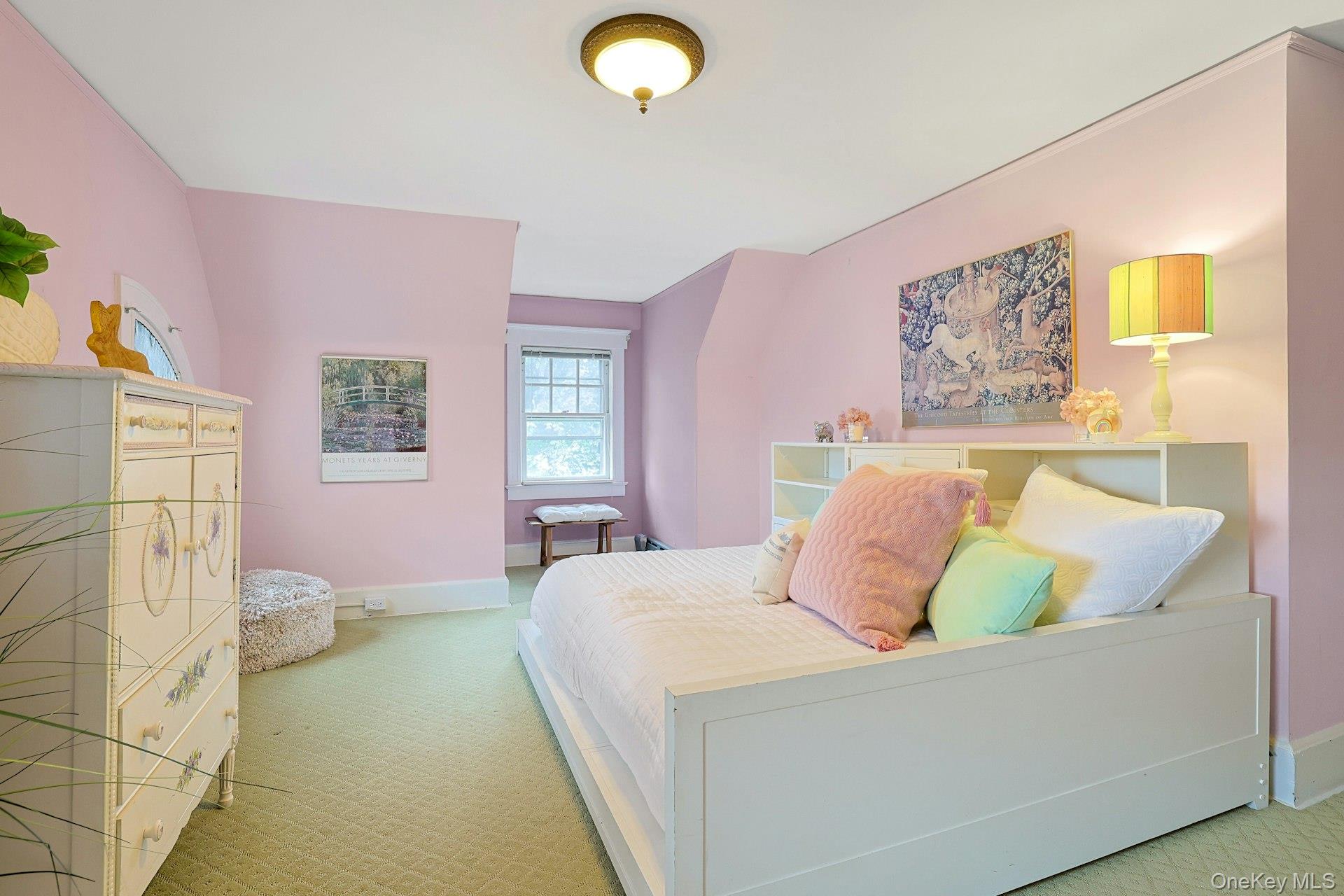 49 Overlook Circle New Rochelle, NY 10804 - Photo 37 of 47 a bedroom with a bed and a couch