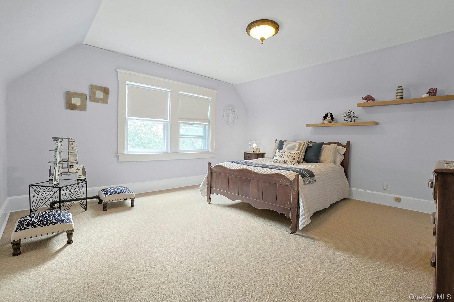 49 Overlook Circle New Rochelle, NY 10804 - Photo 39 of 47 a bedroom with bed and a window