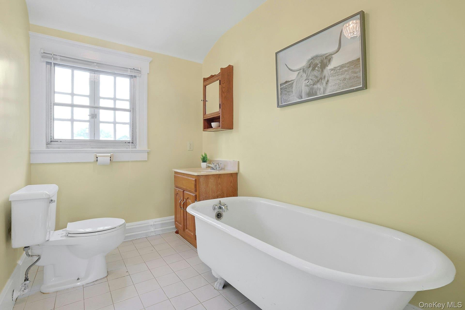 49 Overlook Circle New Rochelle, NY 10804 - Photo 40 of 47 a white bath tub sitting next to a white toilet