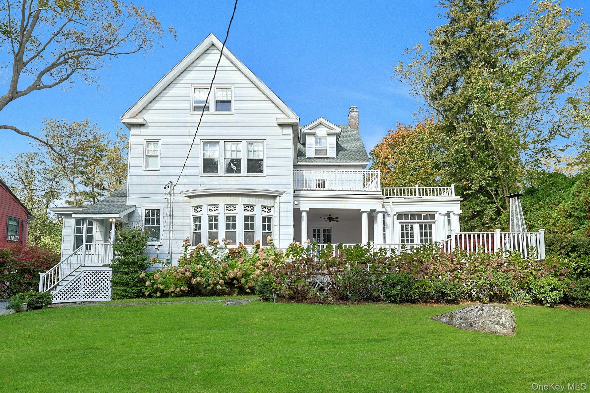 49 Overlook Circle New Rochelle, NY 10804 - Photo 42 of 47 a view of a house with a yard