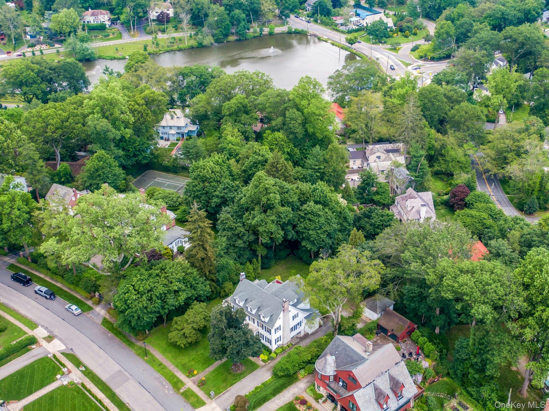 49 Overlook Circle New Rochelle, NY 10804 - Photo 43 of 47 an aerial view of a house with a garden and lake view
