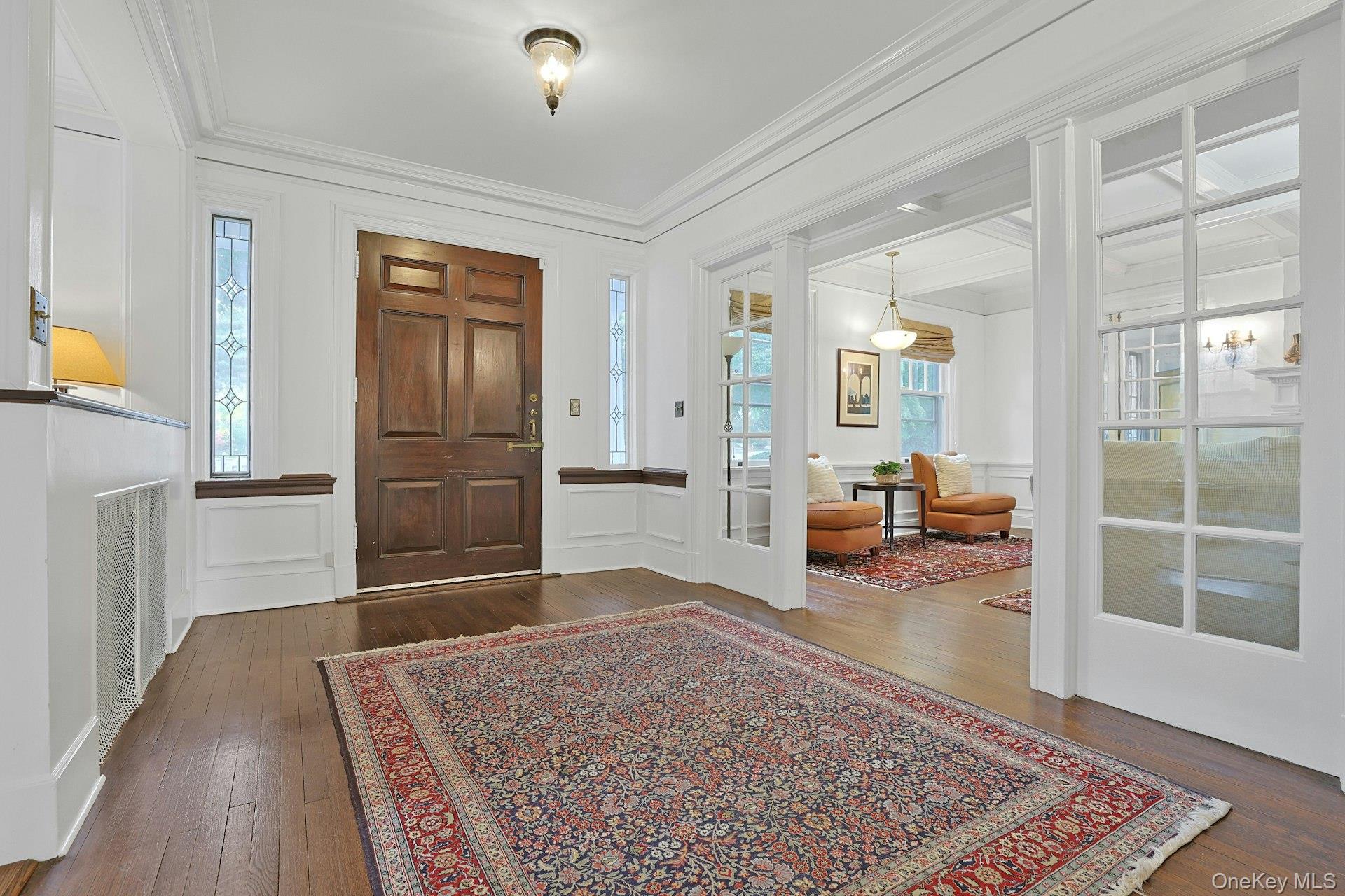 49 Overlook Circle New Rochelle, NY 10804 - Photo 5 of 47 a living room with furniture and a wooden floor