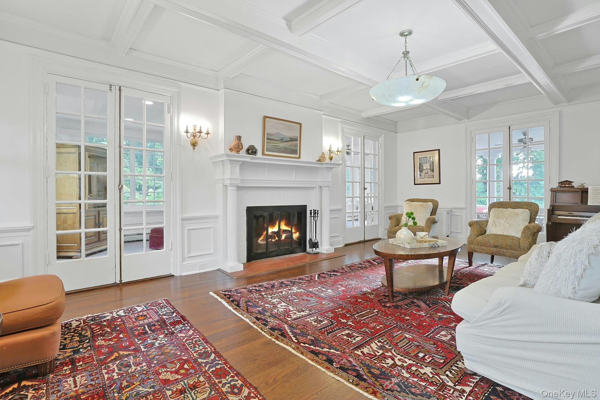 49 Overlook Circle New Rochelle, NY 10804 - Photo 7 of 47 a living room with furniture and a fireplace