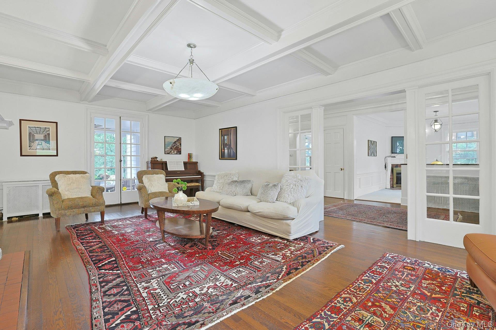 49 Overlook Circle New Rochelle, NY 10804 - Photo 9 of 47 a living room with furniture and a rug