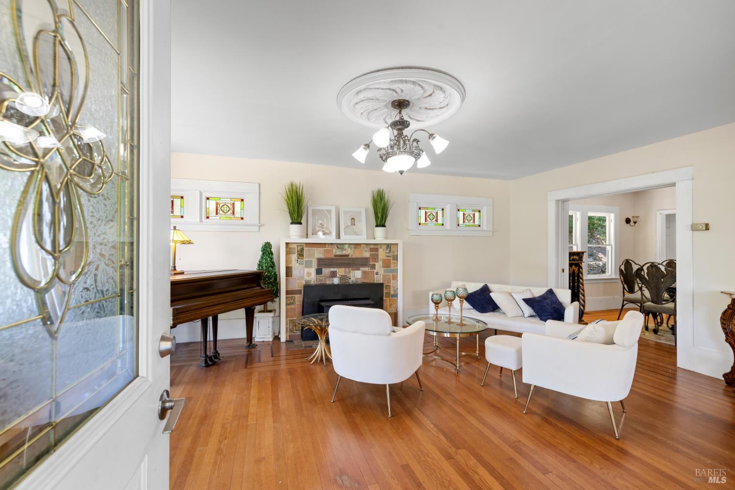 1194 Felta Road Healdsburg, CA 95448 - Photo 14 of 52 a living room with furniture and a wooden floor