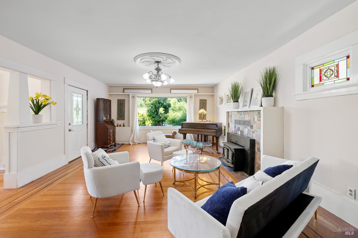 1194 Felta Road Healdsburg, CA 95448 - Photo 15 of 52 a living room with furniture a chandelier and a dining table
