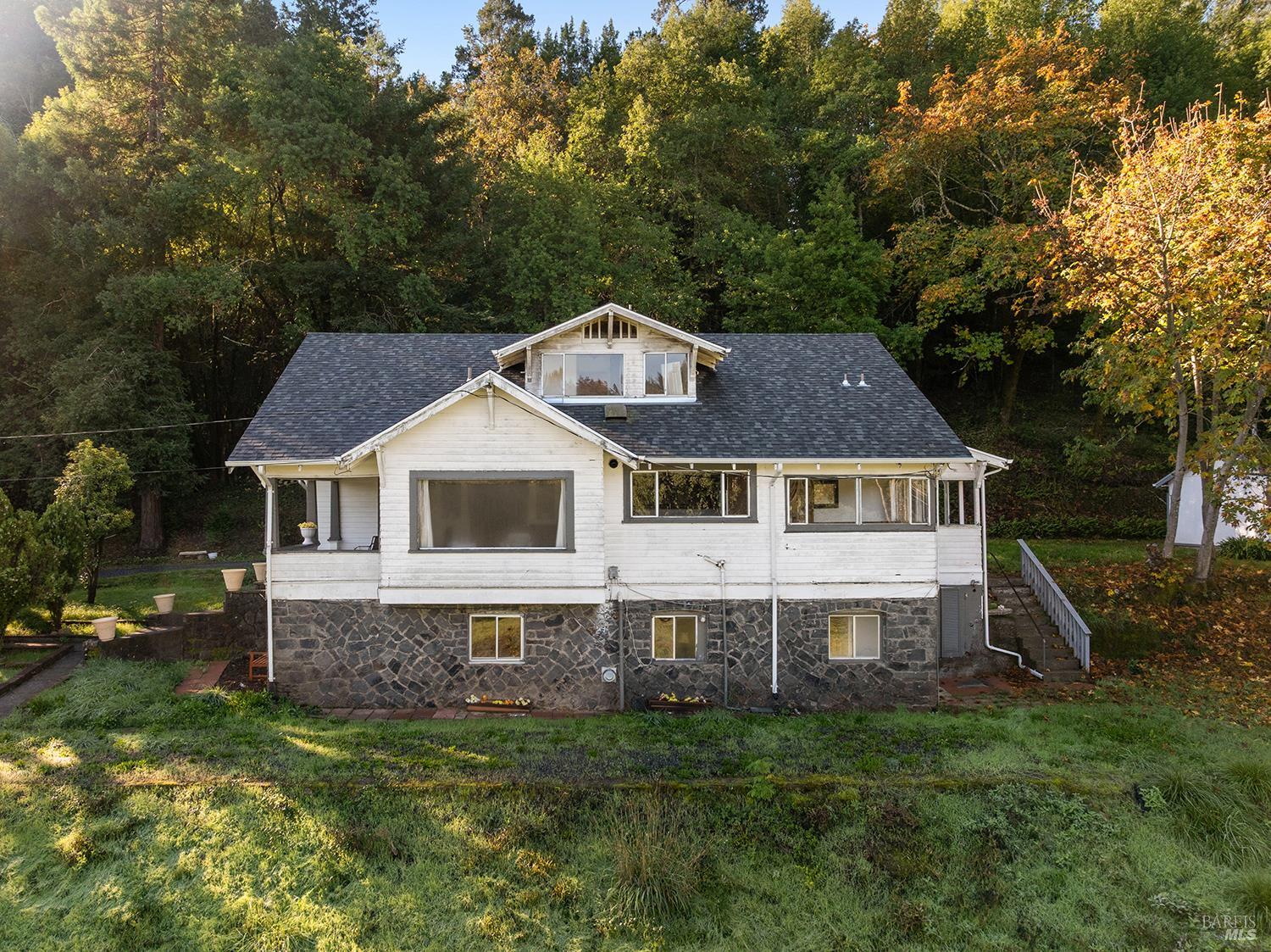 1194 Felta Road Healdsburg, CA 95448 - Photo 28 of 52 a front view of a house with a yard