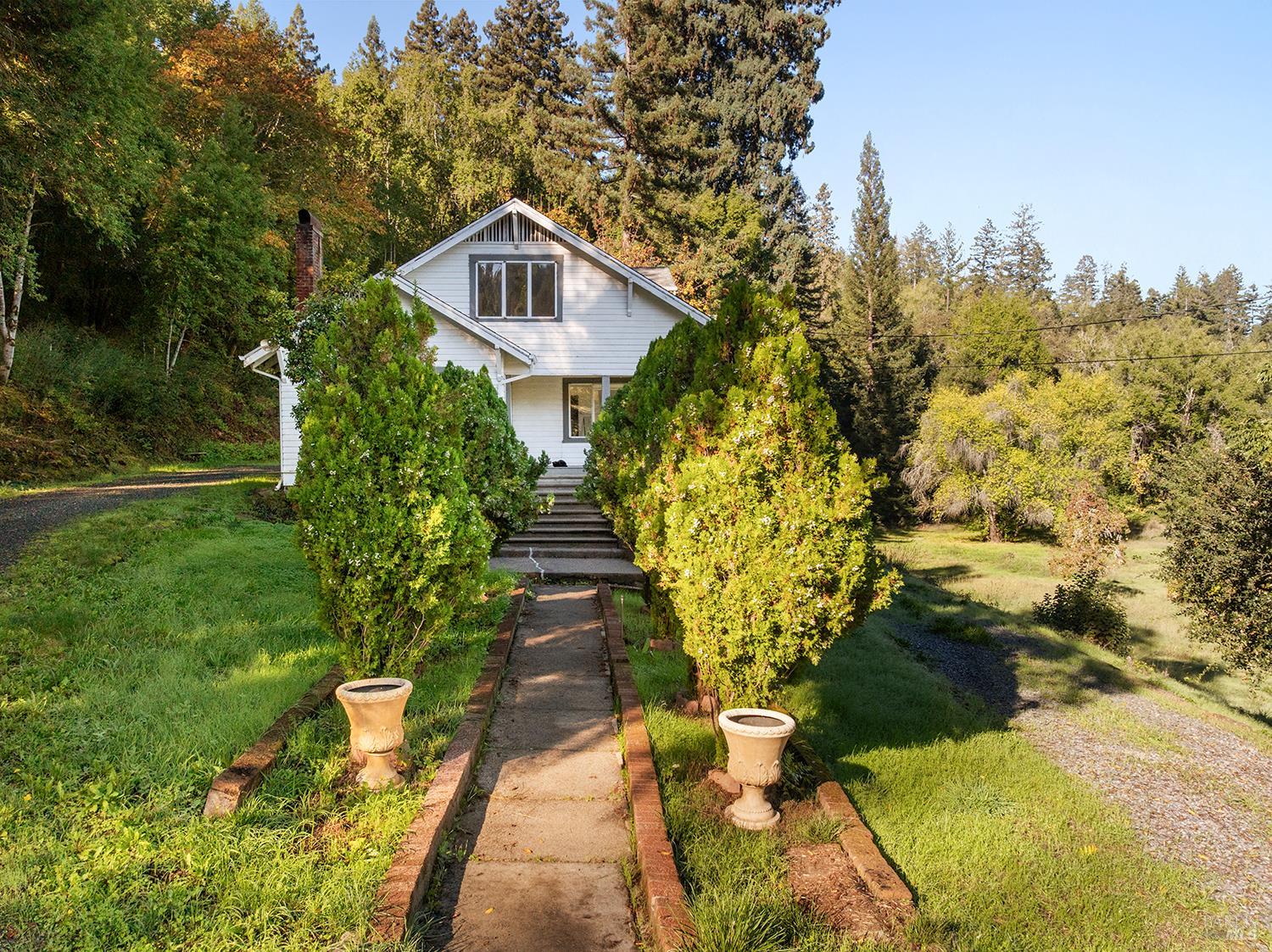 1194 Felta Road Healdsburg, CA 95448 - Photo 9 of 52 a front view of a house with a yard