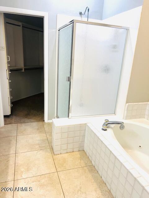 8270 North Hayden Road, Unit 1042 Scottsdale, AZ 85258 - Photo 13 of 30 a bathroom with a bathtub and a shower