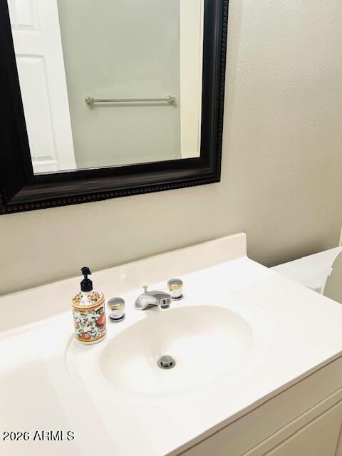 8270 North Hayden Road, Unit 1042 Scottsdale, AZ 85258 - Photo 20 of 30 a bathroom with a sink and a mirror