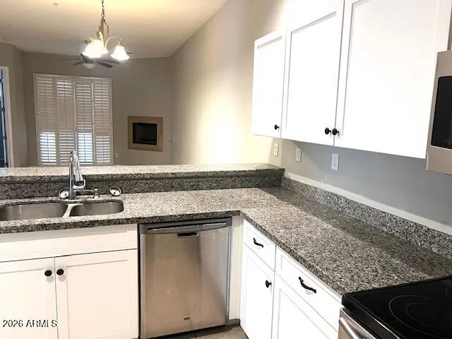 a bathroom with a toilet and a mirror