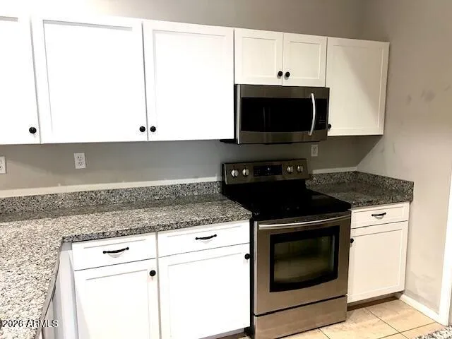 a kitchen with a sink and a window