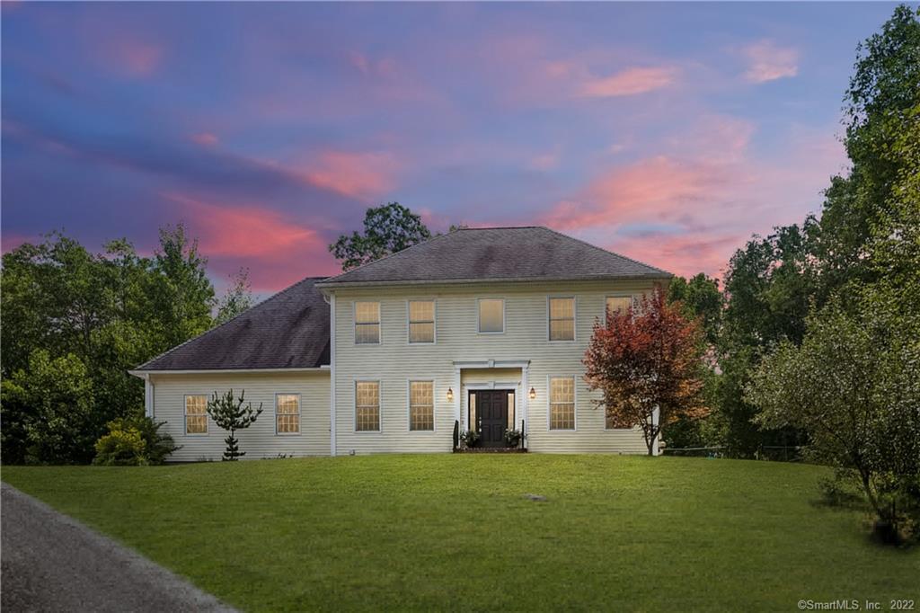 Exterior Front. Spacious at nearly 3,000 sq ft, this beautiful Colonial is sited on 1.86 acres which is private and peaceful
