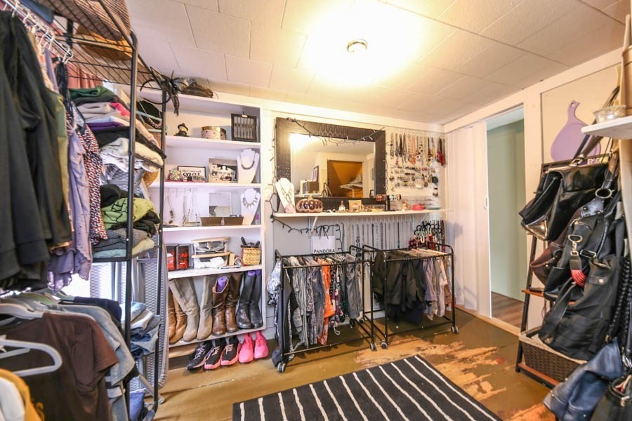 4 Riverview Place Lawrence, MA 01841 - Photo 17 of 21 a view of walk in closet with clothes