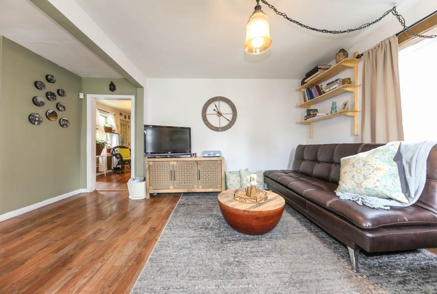 4 Riverview Place Lawrence, MA 01841 - Photo 5 of 21 a living room with furniture and a flat screen tv