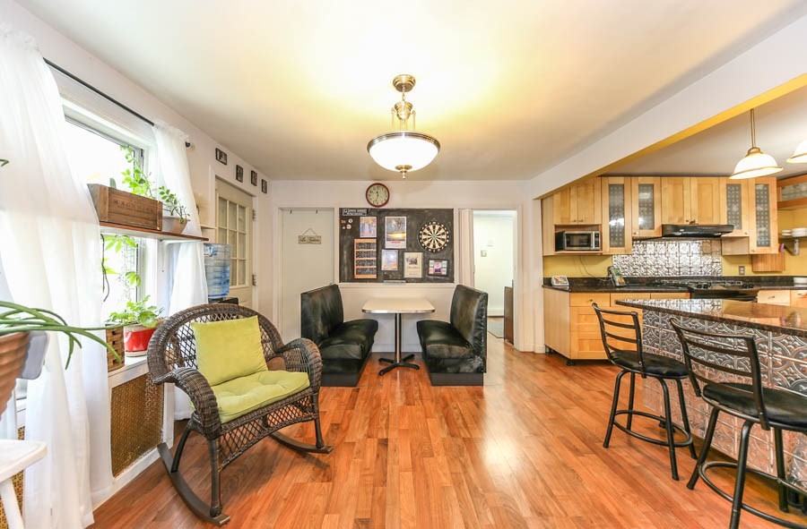4 Riverview Place Lawrence, MA 01841 - Photo 7 of 21 a view of a dining room with furniture window and wooden floor