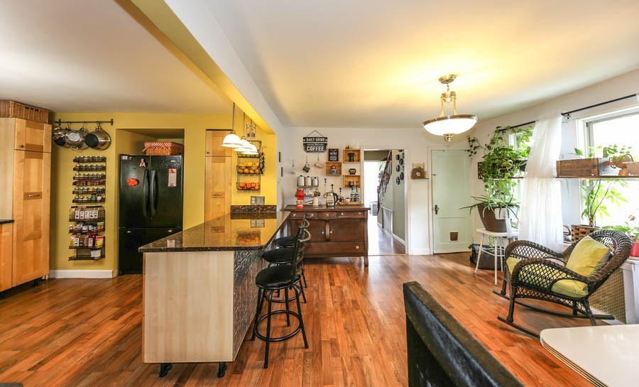 4 Riverview Place Lawrence, MA 01841 - Photo 8 of 21 a view of a dining room with furniture and wooden floor