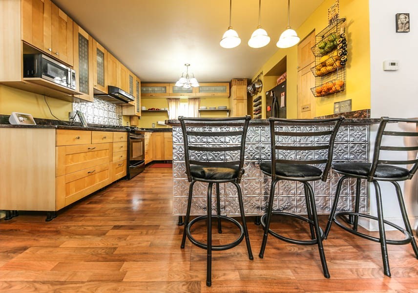 4 Riverview Place Lawrence, MA 01841 - Photo 9 of 21 a view of a chairs and table on the wooden floor