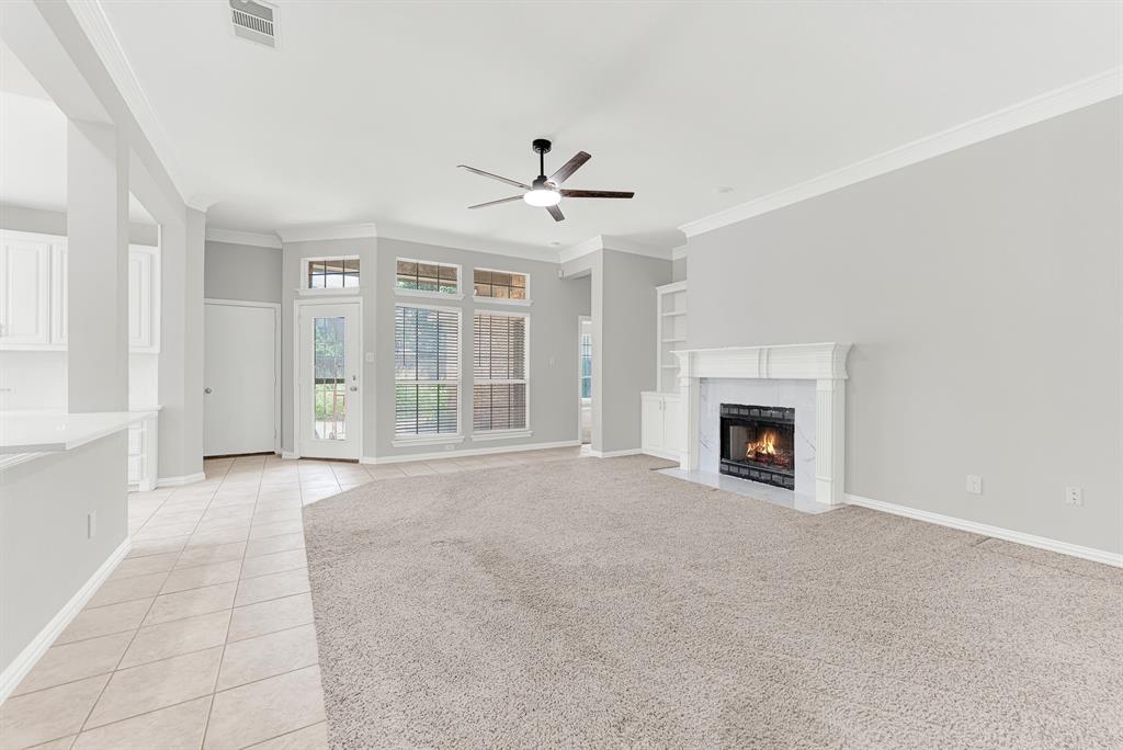 3500 Neiman Road Plano, TX 75025 - Photo 4 of 26 Next is the amazing family room! You'll love the tile in the heavy traffic areas - so durable and easy to clean!