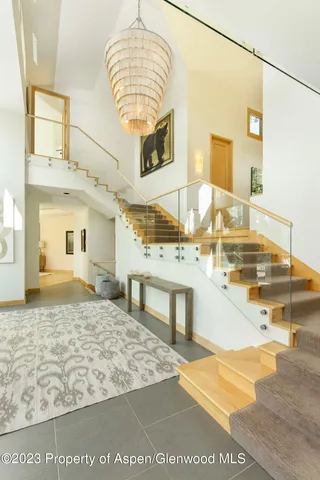 a bathroom with a sink a mirror and a shower