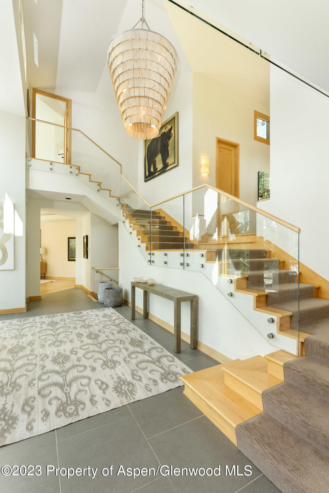 58 Pitkin Way Aspen, CO 81611 - Photo 11 of 33 a bathroom with a sink a mirror and a shower