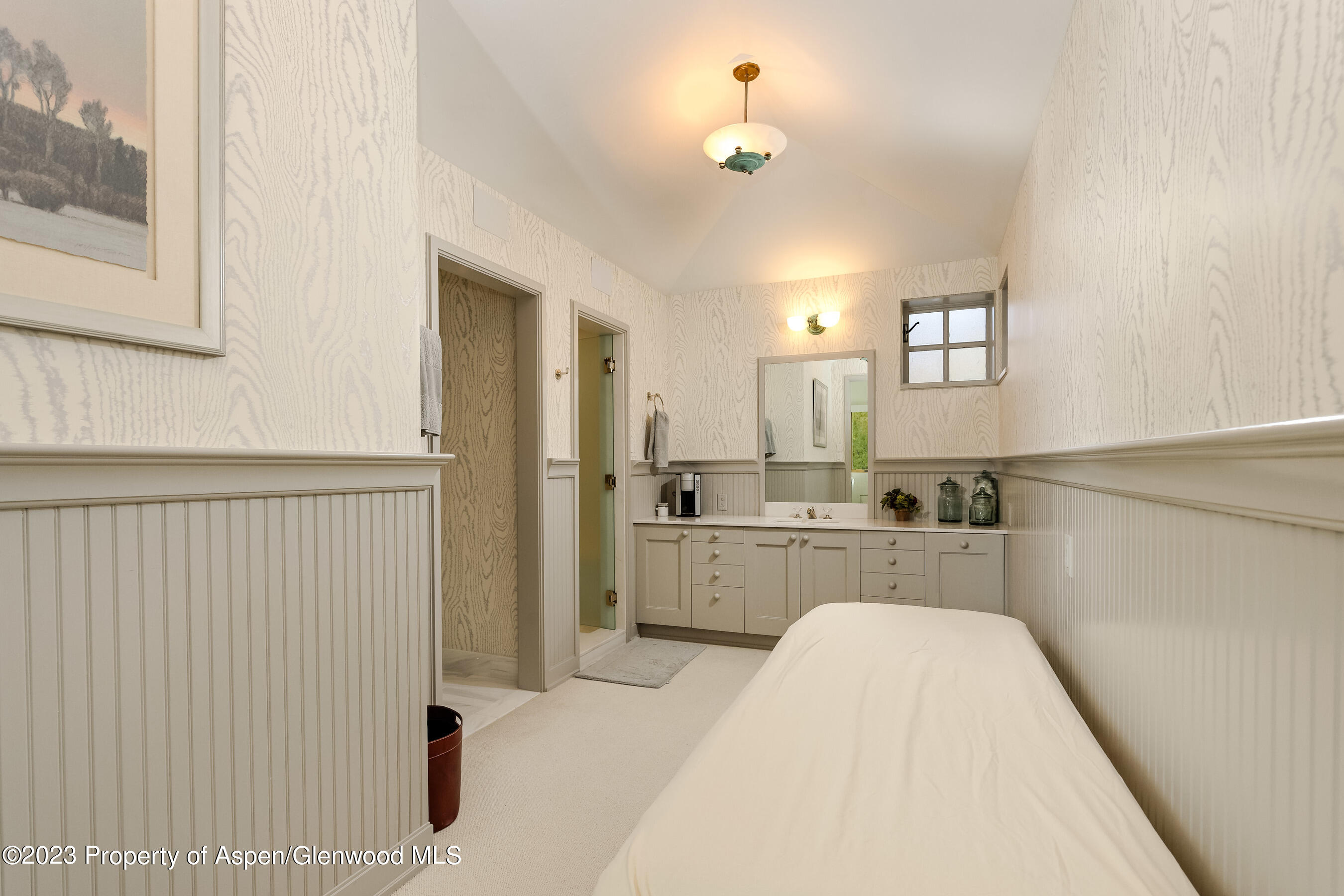 58 Pitkin Way Aspen, CO 81611 - Photo 16 of 33 a large white kitchen with sink and refrigerator