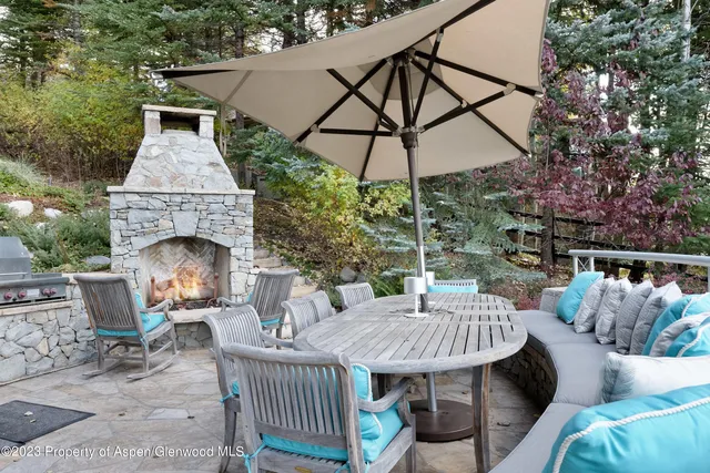 a view of a table and chairs in the patio