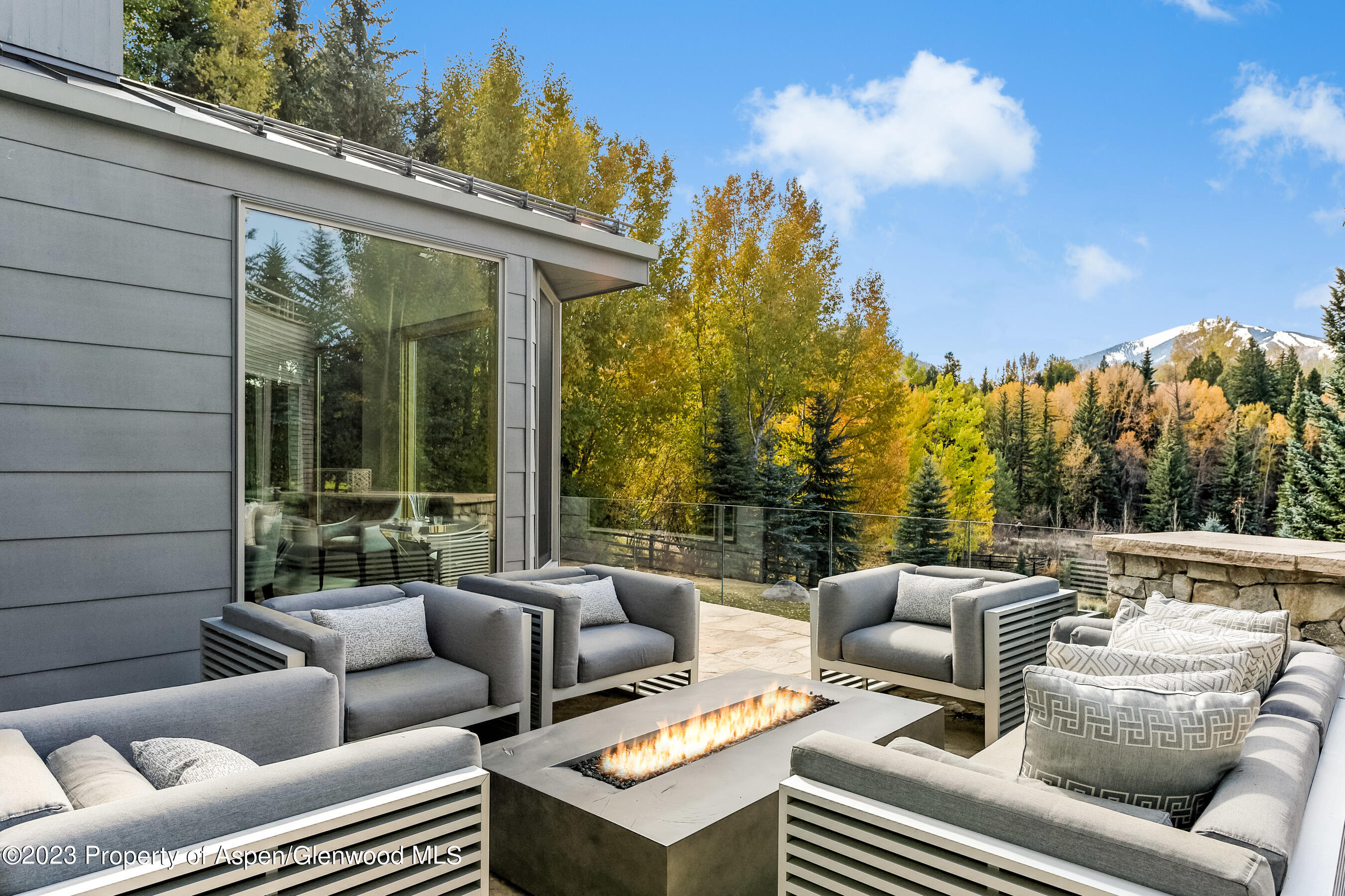 58 Pitkin Way Aspen, CO 81611 - Photo 30 of 33 a outdoor living space with furniture and city view