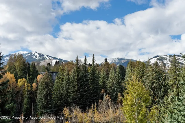 a view of a city and with green space