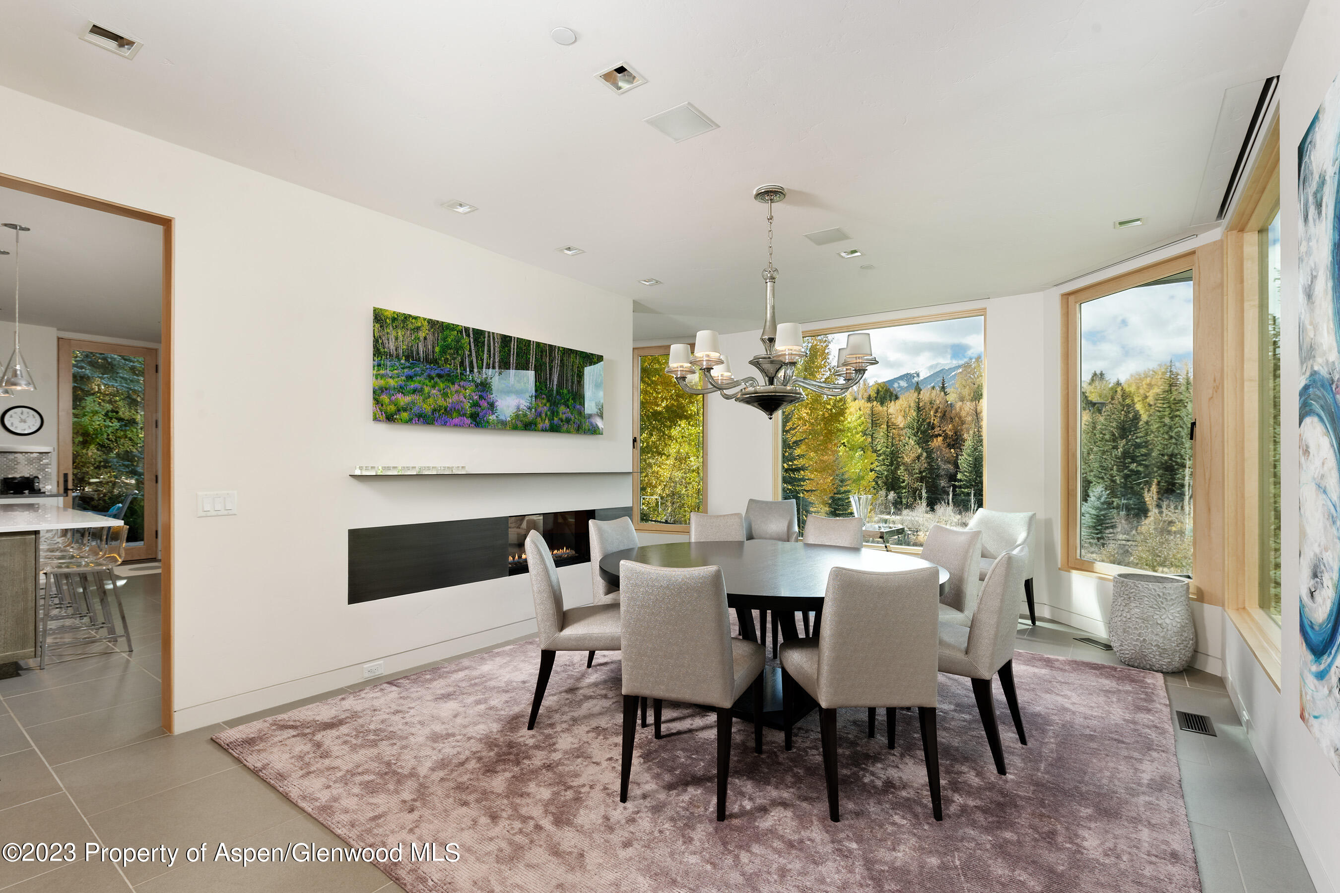 58 Pitkin Way Aspen, CO 81611 - Photo 4 of 33 a view of a dining room with furniture window and outside view