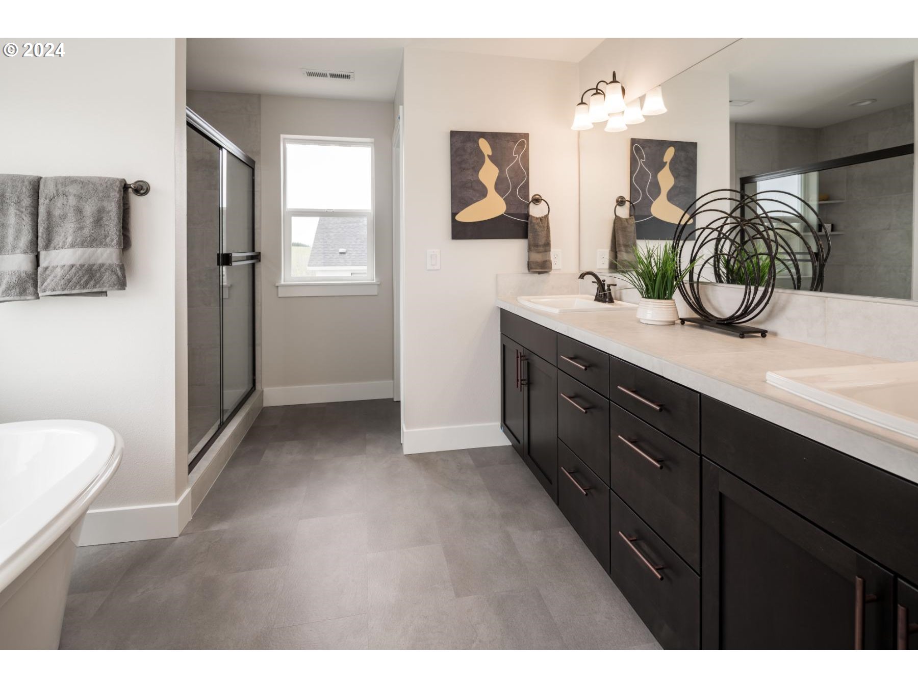 927 Northwest 178th Street Ridgefield, WA 98642 - Photo 16 of 18 a bathroom with a double vanity sink mirror and toilet