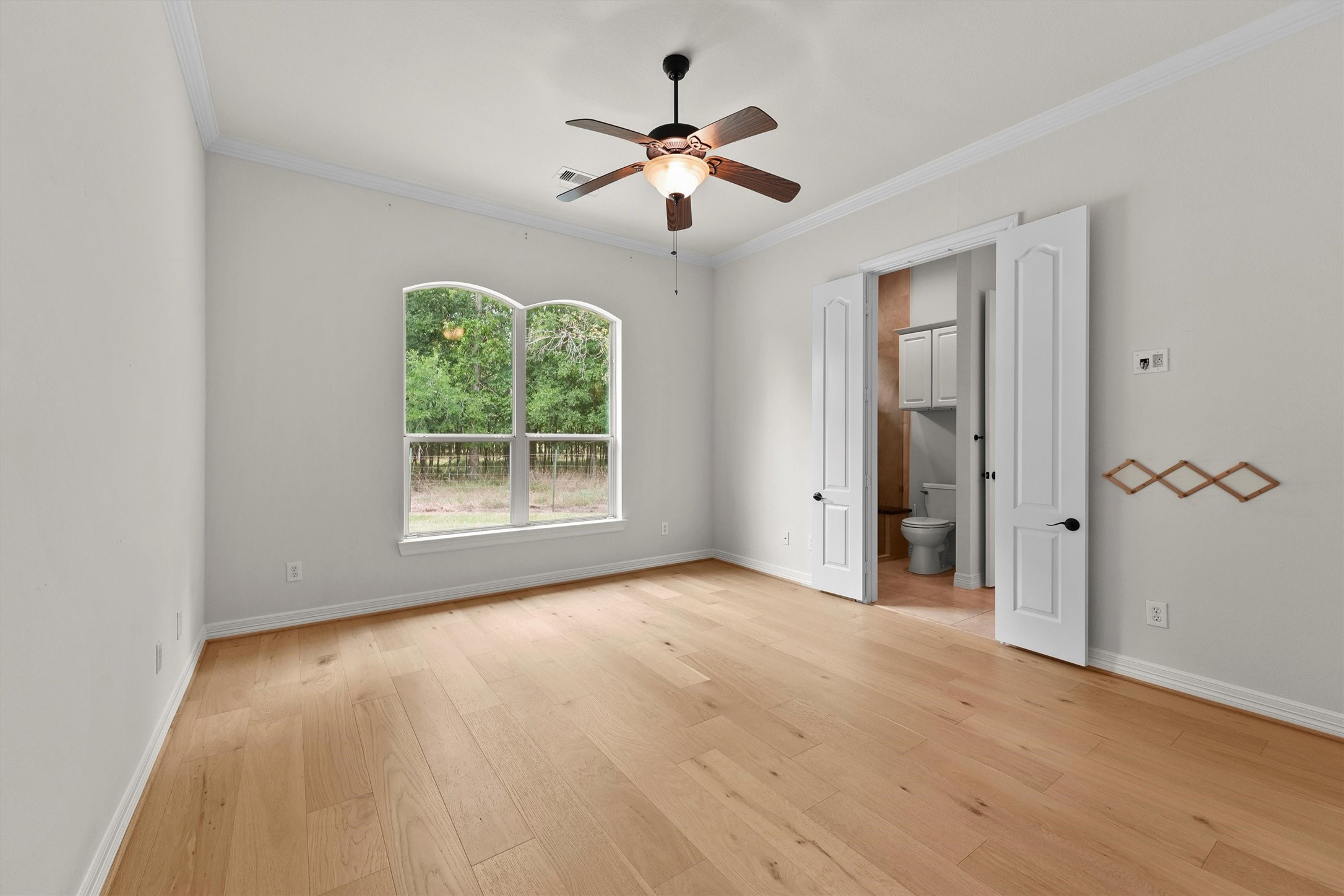 4102 Worthing Drive Fulshear, TX 77441 - Photo 20 of 30 a view of an empty room with a window