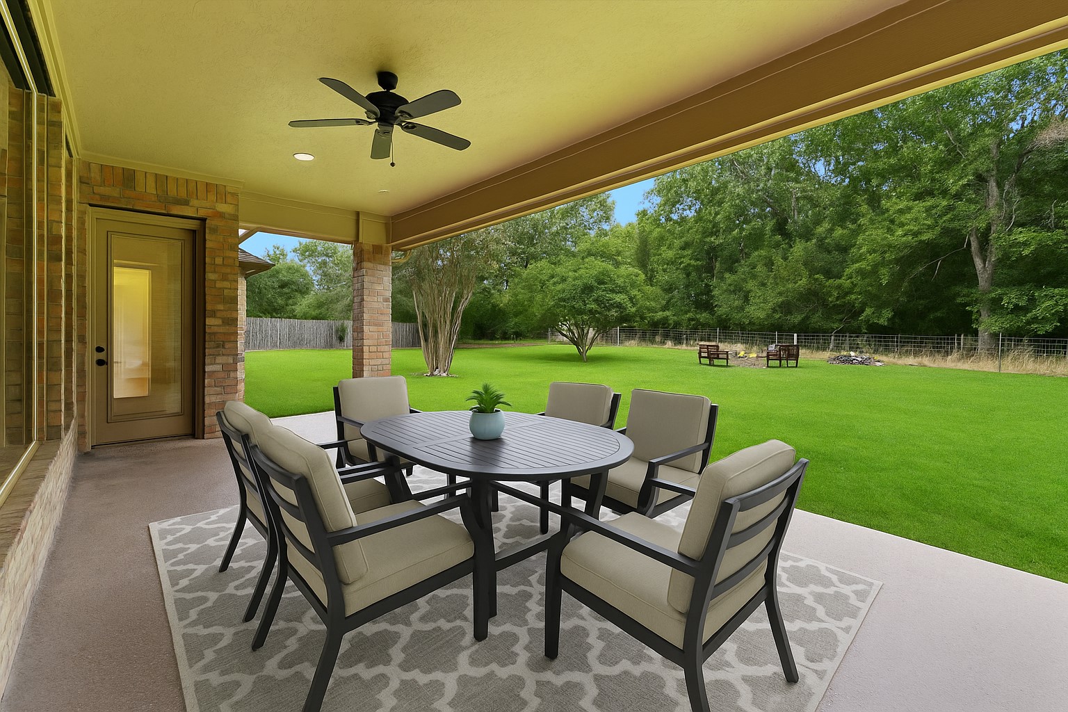 4102 Worthing Drive Fulshear, TX 77441 - Photo 21 of 30 a view of a patio with a backyard