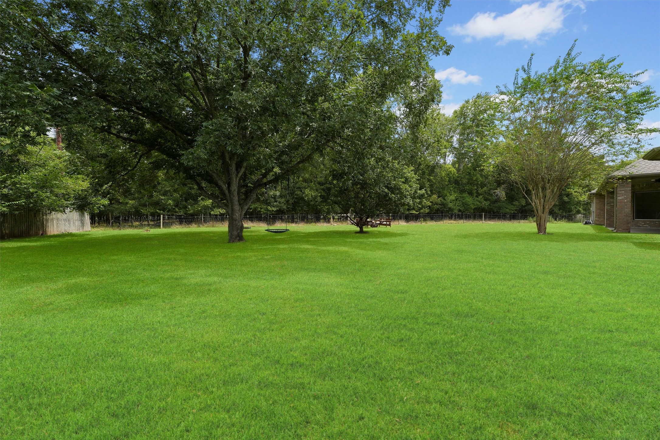 4102 Worthing Drive Fulshear, TX 77441 - Photo 22 of 30 a view of green field with trees in the background