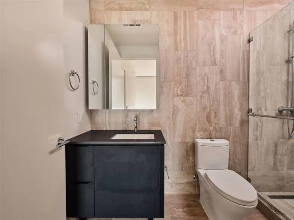 a view of a city with tall buildings