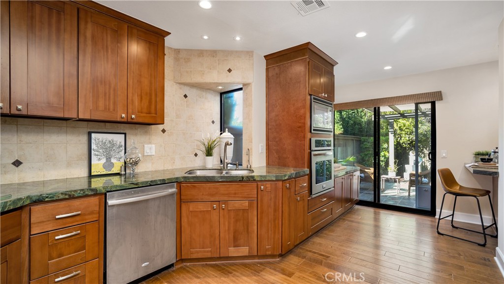 57 Pinewood Irvine, CA 92604 - Photo 19 of 39 Kitchen opens out onto the garden
