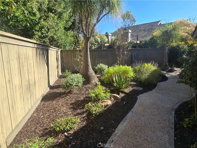 a view of a garden with pathway