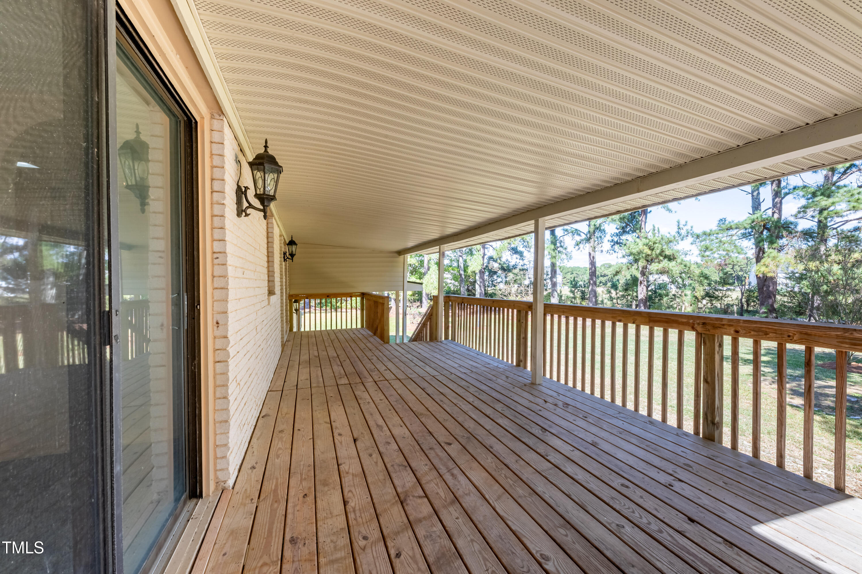 2431 Amelia Church Road Clayton, NC 27520 - Photo 9 of 31 Cool Covered Deck off Dining Room