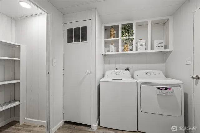 a utility room with dryer and washer