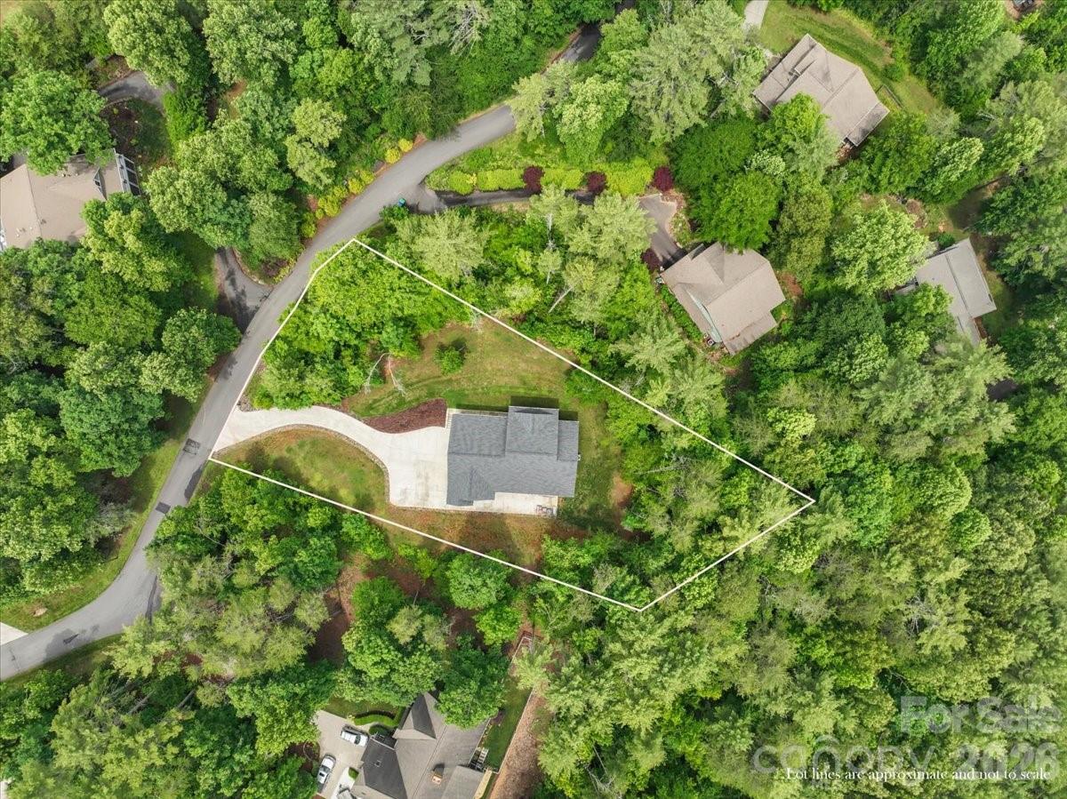 36 Cherry Ridge Lane Weaverville, NC 28787 - Photo 35 of 37 an aerial view of a house with a yard